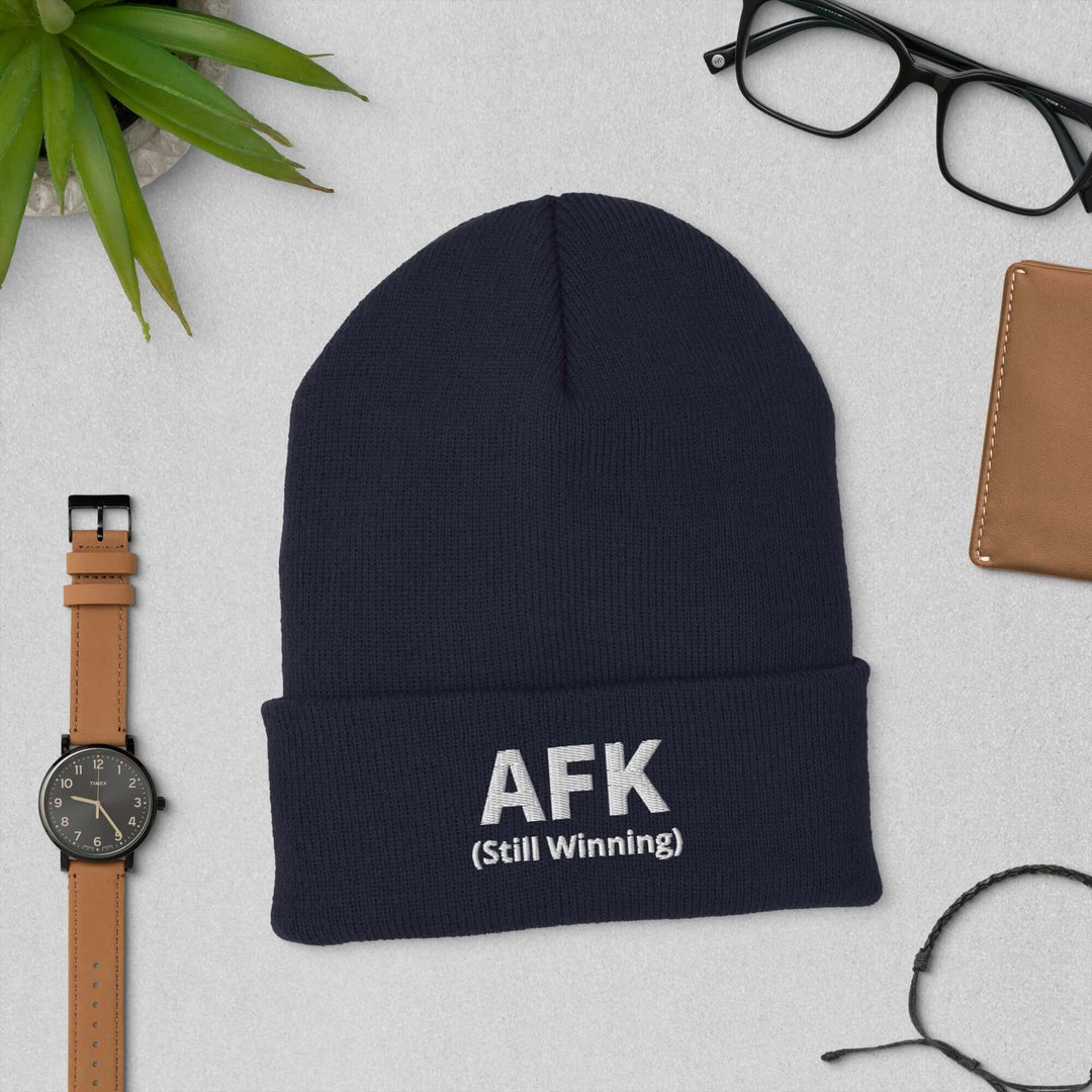AFK cuffed beanie displayed with accessories, featuring &