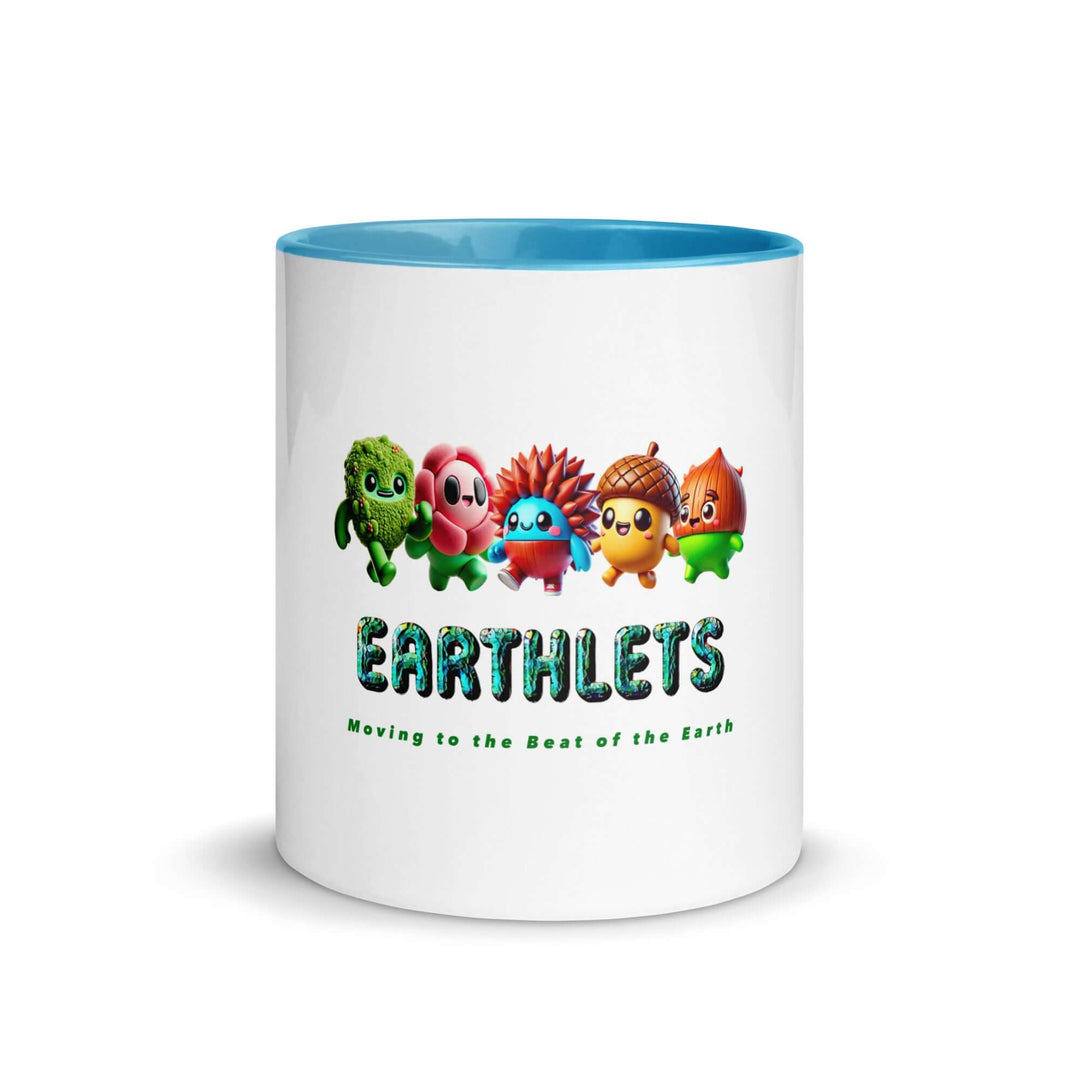 Earthlets mug featuring colorful characters and blue interior, with text 'Moving to the Beat of the Earth' on a white ceramic background.