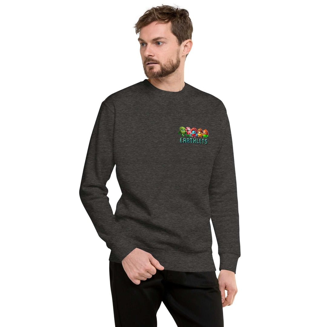 Man wearing Earthlets unisex premium sweatshirt in dark color, showcasing contemporary style and comfort.