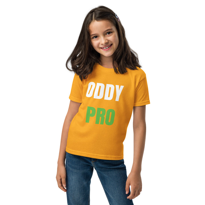 Girl wearing an Oddy Pro Youth t-shirt in bright orange, showcasing the brand&