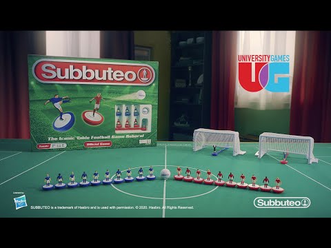 Subbuteo Main Game displayed with players on a tabletop football pitch and iconic game box in the background.