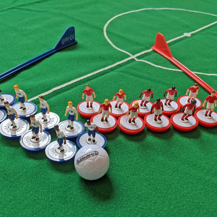 Subbuteo England Edition Main Game featuring player figures and ball on a green pitch.
