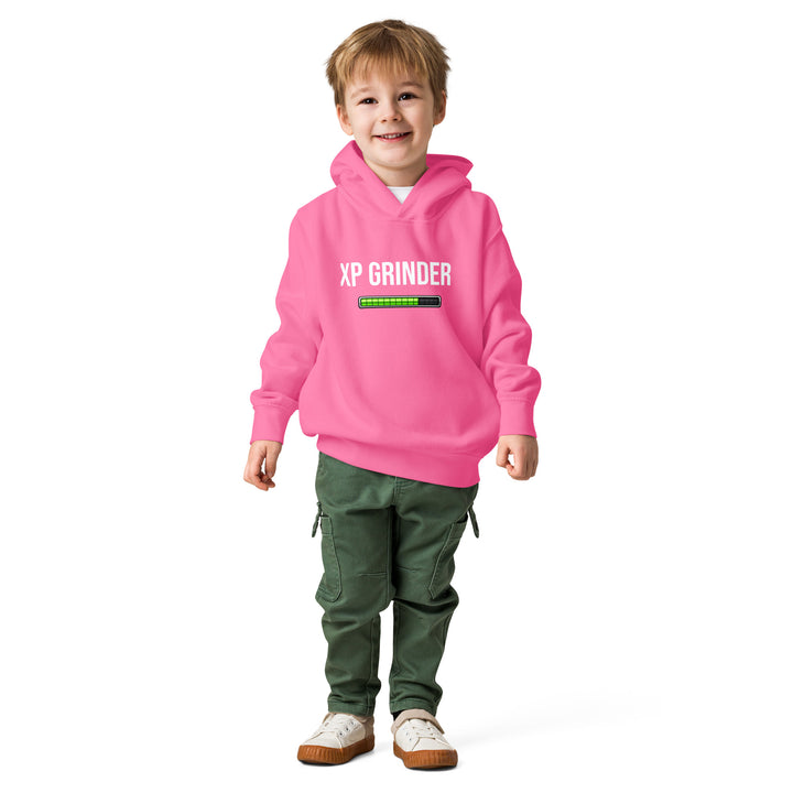XP Grinder Toddler fleece pullover hoodie in pink worn by a smiling boy, perfect for playtime and cozy warmth.