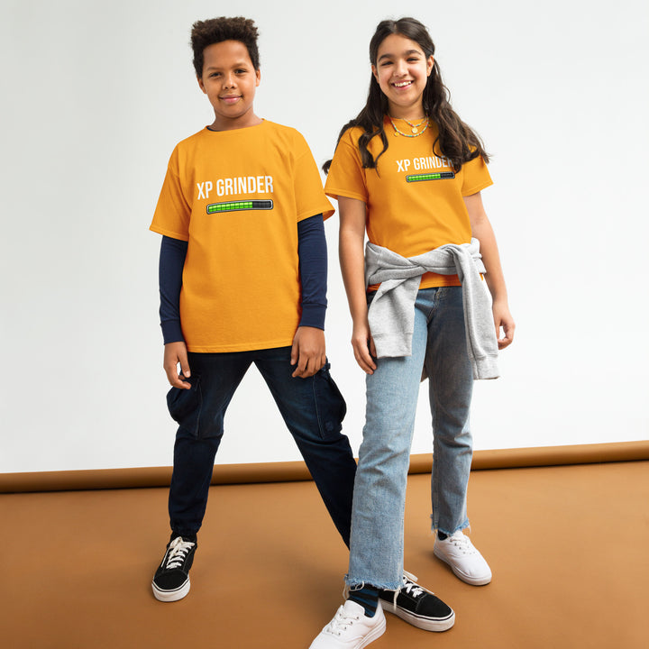 Two children wearing XP Grinder Youth classic tee in vibrant orange, showcasing style and comfort.